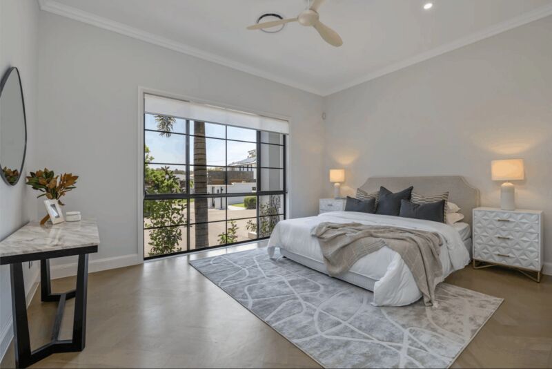 Master bedroom with palm-view window