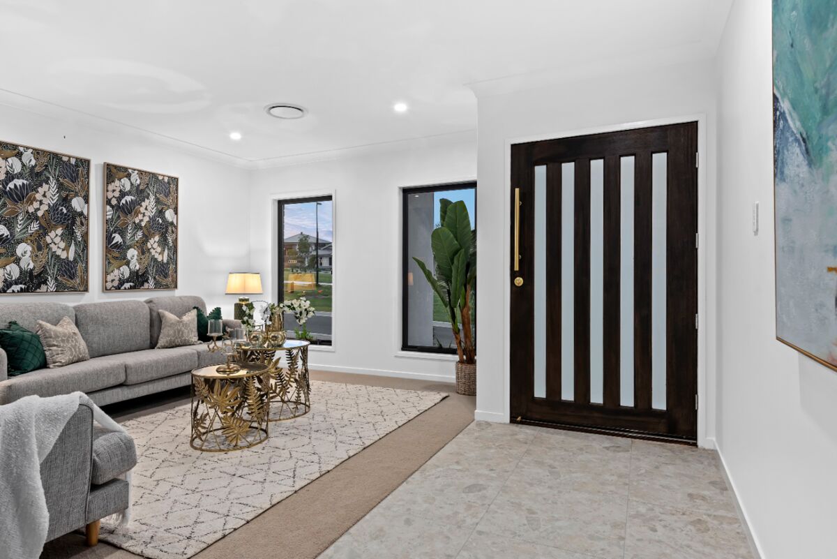 Entry living with timber door and art